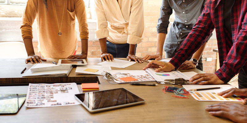 people discussing their business rebranding